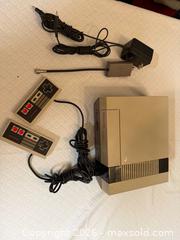MaxSold Auction: Vintage Nintendo NES System Console  - Toronto (Ontario, Canada) SELLER MANAGED Downsizing Online Auction -  Palamar Road