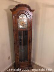 MaxSold Auction: Howard Miller Oak Grandfather Clock with Moonphase Dial - Upper Darby Township (Pennsylvania, USA) SELLER MANAGED Estate Sale Online Auction - State Road (CONDO)