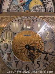 MaxSold Auction: Howard Miller Oak Grandfather Clock with Moonphase Dial - Upper Darby Township (Pennsylvania, USA) SELLER MANAGED Estate Sale Online Auction - State Road (CONDO)