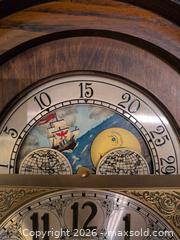 MaxSold Auction: Howard Miller Oak Grandfather Clock with Moonphase Dial - Upper Darby Township (Pennsylvania, USA) SELLER MANAGED Estate Sale Online Auction - State Road (CONDO)