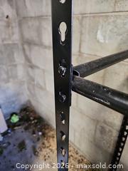 MaxSold Auction: Adjustable Black Steel Storage Shelf / Tire Rack, ~5 ft tall - Toronto (Ontario, Canada) SELLER MANAGED Moving Online Auction - Enfield Avenue