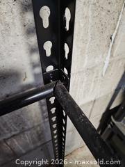 MaxSold Auction: Adjustable Black Steel Storage Shelf / Tire Rack, ~5 ft tall - Toronto (Ontario, Canada) SELLER MANAGED Moving Online Auction - Enfield Avenue