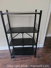 MaxSold Auction: Black Metal Folding Shelving Unit with 4 Shelves on Casters - Toronto (Ontario, Canada) SELLER MANAGED Moving Online Auction - Enfield Avenue