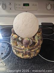 MaxSold Auction: Folk/Naïve Art Candle Holder with Circular Figurines Includes Moon light - Toronto (Ontario, Canada) SELLER MANAGED Moving Online Auction - Enfield Avenue