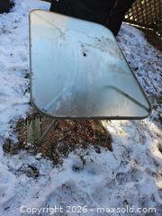 MaxSold Auction: Glass Top Metal Patio Table with Umbrella Hole, Seats 4 - Toronto (Ontario, Canada) SELLER MANAGED Moving Online Auction - Enfield Avenue