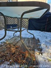 MaxSold Auction: Glass Top Metal Patio Table with Umbrella Hole, Seats 4 - Toronto (Ontario, Canada) SELLER MANAGED Moving Online Auction - Enfield Avenue