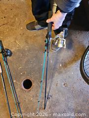 MaxSold Auction: Lot of 2 Fishing Rods with Mitchell and Zebco - Toronto (Ontario, Canada) SELLER MANAGED Moving Online Auction - Enfield Avenue