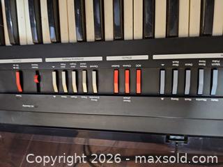 MaxSold Auction: Lowrey Micro Genie Electronic Keyboard, Black - Toronto (Ontario, Canada) SELLER MANAGED Moving Online Auction - Enfield Avenue
