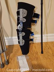 MaxSold Auction: Össur Knee Brace, Crutches, Cane & Shower/Cast Protector - Toronto (Ontario, Canada) SELLER MANAGED Moving Online Auction - Enfield Avenue