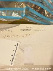 MaxSold Auction: Assorted Christmas Decor Lot with Ornaments, Ribbons, Figurines B - Ottawa (Ontario, Canada) PARTNER MANAGED Downsizing Online Auction - Topley Crescent