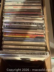 MaxSold Auction: Assorted Music CD Collection — Pop, Rock, Classics, Karaoke B - Ottawa (Ontario, Canada) PARTNER MANAGED Downsizing Online Auction - Topley Crescent