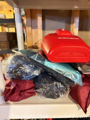 MaxSold Auction: Assorted Travel & Accessory Lot — Backpacks, Chargers, Compasses B - Ottawa (Ontario, Canada) PARTNER MANAGED Downsizing Online Auction - Topley Crescent
