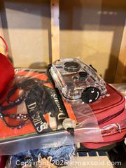 MaxSold Auction: Assorted Travel & Accessory Lot — Backpacks, Chargers, Compasses B - Ottawa (Ontario, Canada) PARTNER MANAGED Downsizing Online Auction - Topley Crescent