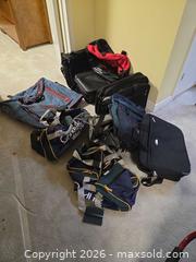 MaxSold Auction: Assorted Travel Bags and Briefcases (Mixed Brands) B - Ottawa (Ontario, Canada) PARTNER MANAGED Downsizing Online Auction - Topley Crescent