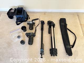 MaxSold Auction: Canon T50 & Olympus OM-1 35mm Film Cameras with Lenses A - Ottawa (Ontario, Canada) PARTNER MANAGED Downsizing Online Auction - Topley Crescent