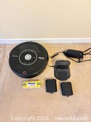 MaxSold Auction: iRobot Roomba Pet Series Robot Vacuum (500/600-era) A - Ottawa (Ontario, Canada) PARTNER MANAGED Downsizing Online Auction - Topley Crescent