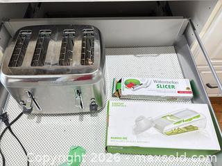 MaxSold Auction: Kitchen slicers and 4-slice toaster bundle B - Ottawa (Ontario, Canada) PARTNER MANAGED Downsizing Online Auction - Topley Crescent