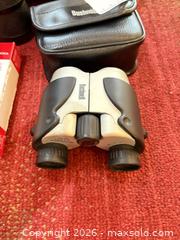 MaxSold Auction: Mixed Optics & Electronics: Bushnell Binoculars, Polaroid Camera, Fitbit A - Ottawa (Ontario, Canada) PARTNER MANAGED Downsizing Online Auction - Topley Crescent