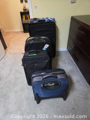 MaxSold Auction: Set of 4 Suitcases / Luggage A - Ottawa (Ontario, Canada) PARTNER MANAGED Downsizing Online Auction - Topley Crescent