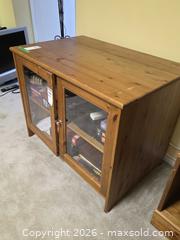 MaxSold Auction: Solid Wood Cabinet / Media Console with Glass-Front Doors C - Ottawa (Ontario, Canada) PARTNER MANAGED Downsizing Online Auction - Topley Crescent