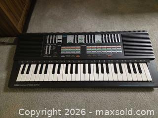 MaxSold Auction: Yamaha PSS-570 49-Key Portable Keyboard A - Ottawa (Ontario, Canada) PARTNER MANAGED Downsizing Online Auction - Topley Crescent