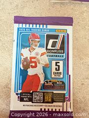 MaxSold Auction: 2025 Panini Donruss & Score Football Trading Card Packs (5) - Welland (Ontario, Canada) SELLER MANAGED Reseller Online Auction - Young Road