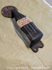 MaxSold Auction: Cast iron Coca-Cola door handle - Welland (Ontario, Canada) SELLER MANAGED Reseller Online Auction - Young Road
