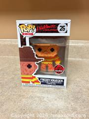 MaxSold Auction: Funko Pop! Freddy Krueger Pop! 8-Bit #25 (EB Exclusive). CCM - Welland (Ontario, Canada) SELLER MANAGED Reseller Online Auction - Young Road
