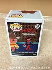 MaxSold Auction: Funko Pop! Freddy Krueger Pop! 8-Bit #25 (EB Exclusive). CCM - Welland (Ontario, Canada) SELLER MANAGED Reseller Online Auction - Young Road