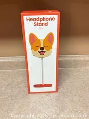 MaxSold Auction: New! Corgi Dog Figurine Headphone Stand, Orange & Red Plastic - Welland (Ontario, Canada) SELLER MANAGED Reseller Online Auction - Young Road