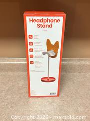 MaxSold Auction: New! Corgi Dog Figurine Headphone Stand, Orange & Red Plastic - Welland (Ontario, Canada) SELLER MANAGED Reseller Online Auction - Young Road