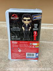 MaxSold Auction: New Funko Jurassic Park Ian Malcolm Vinyl Figure (Blockbuster Rewind) - Welland (Ontario, Canada) SELLER MANAGED Reseller Online Auction - Young Road