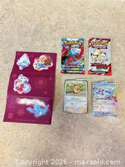 MaxSold Auction: New! Pokémon Trading Card Lot: Booster Packs, Single Cards, Stickers - Welland (Ontario, Canada) SELLER MANAGED Reseller Online Auction - Young Road