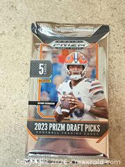 MaxSold Auction: Panini Trading Card Packs - 5 Packs (Donruss 2025, Prizm Draft Picks 2023) - Welland (Ontario, Canada) SELLER MANAGED Reseller Online Auction - Young Road