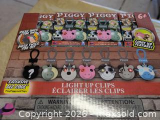 MaxSold Auction: Piggy Light-Up Clip Keychains, Lot of 24 - Welland (Ontario, Canada) SELLER MANAGED Reseller Online Auction - Young Road