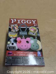 MaxSold Auction: Piggy Light-Up Clip Keychains, Lot of 24 - Welland (Ontario, Canada) SELLER MANAGED Reseller Online Auction - Young Road