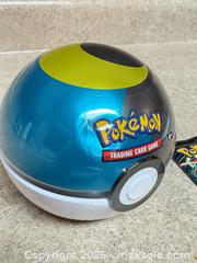 MaxSold Auction: Pokémon Crown Zenith Poké Ball Tin with Sealed Booster Pack, tin 2024 pack 2023 - Welland (Ontario, Canada) SELLER MANAGED Reseller Online Auction - Young Road