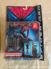 MaxSold Auction: ToyBiz Spider-Man (Peter Parker) Action Figure — Carded - Welland (Ontario, Canada) SELLER MANAGED Reseller Online Auction - Young Road