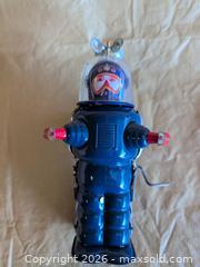 MaxSold Auction: Wind up moon explorer tin toy - Welland (Ontario, Canada) SELLER MANAGED Reseller Online Auction - Young Road