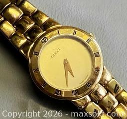 MaxSold Auction: Vintage Gucci 3300.2.L Series GOLD Plated Swiss Made Watch in Original Box  - Toronto (Ontario, Canada) PARTNER MANAGED Reseller Online Auction - Queen Street West