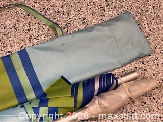 MaxSold Auction: NEW Tommy Bahama Sand Anchor Beach Umbrella - Campbell (California, USA) PARTNER MANAGED Estate Sale Online Auction -  Dell Avenue