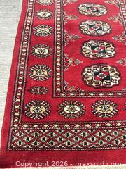 MaxSold Auction: Burgundy Oriental/Persian Style Handmade Wool Area Rug - San Jose (California, USA) SELLER MANAGED Downsizing Online Auction - East Humboldt Street
