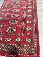 MaxSold Auction: Burgundy Oriental/Persian Style Handmade Wool Area Rug - San Jose (California, USA) SELLER MANAGED Downsizing Online Auction - East Humboldt Street
