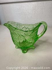 MaxSold Auction: Green Pressed Glass Creamer with Molded Leaf & Fruit Pattern - San Jose (California, USA) SELLER MANAGED Downsizing Online Auction - East Humboldt Street