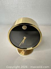 MaxSold Auction: Howard Miller Mid-Century Brass Table/Desk Clock - San Jose (California, USA) SELLER MANAGED Downsizing Online Auction - East Humboldt Street
