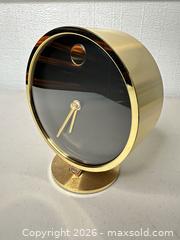 MaxSold Auction: Howard Miller Mid-Century Brass Table/Desk Clock - San Jose (California, USA) SELLER MANAGED Downsizing Online Auction - East Humboldt Street