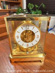 MaxSold Auction: Jaeger-LeCoultre Atmos Brass Gold-Tone Table Clock - San Jose (California, USA) SELLER MANAGED Downsizing Online Auction - East Humboldt Street