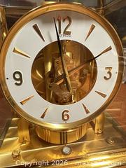 MaxSold Auction: Jaeger-LeCoultre Atmos Brass Gold-Tone Table Clock - San Jose (California, USA) SELLER MANAGED Downsizing Online Auction - East Humboldt Street