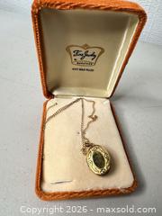 MaxSold Auction: Marathon 12K Gold Filled Locket Necklace - San Jose (California, USA) SELLER MANAGED Downsizing Online Auction - East Humboldt Street