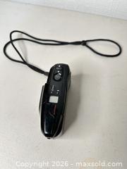 MaxSold Auction: Olympus Stylus Zoom 35mm Point & Shoot Film Camera - Black - San Jose (California, USA) SELLER MANAGED Downsizing Online Auction - East Humboldt Street